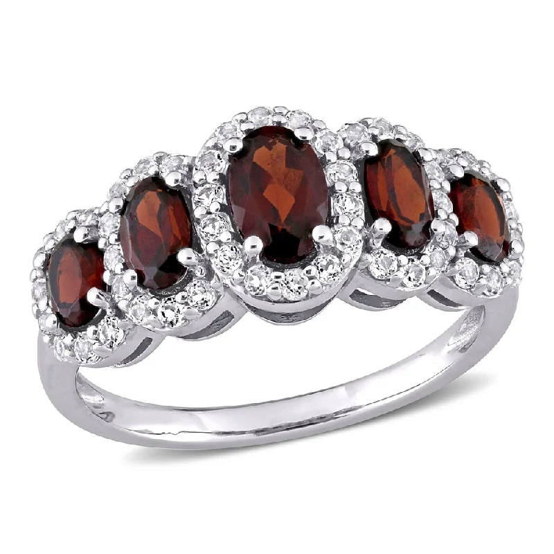 Miadora 10k White Gold Oval-cut Garnet and White Topaz 5-Stone Halo Ring